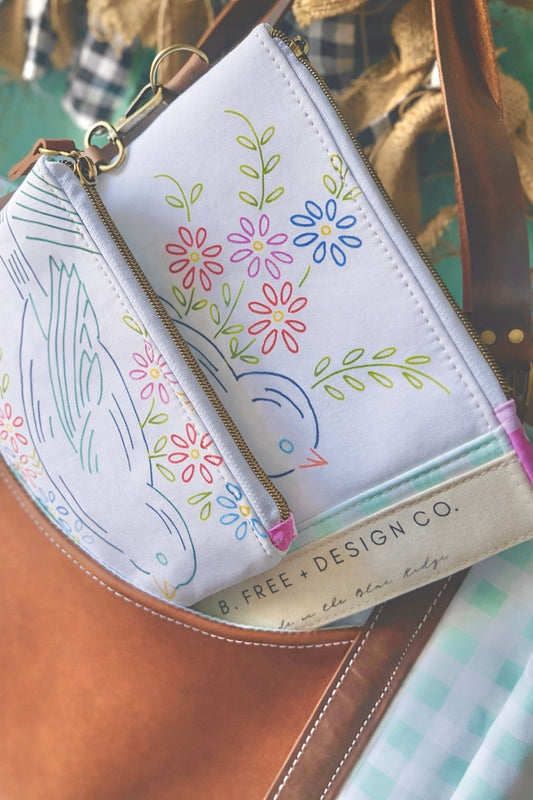 B. FREE-BIRD Travel Pouch Set